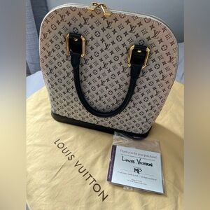 Louis Vuitton pre-owned
Large Alma Canvas Dome Shape Handbag
Blue monogram